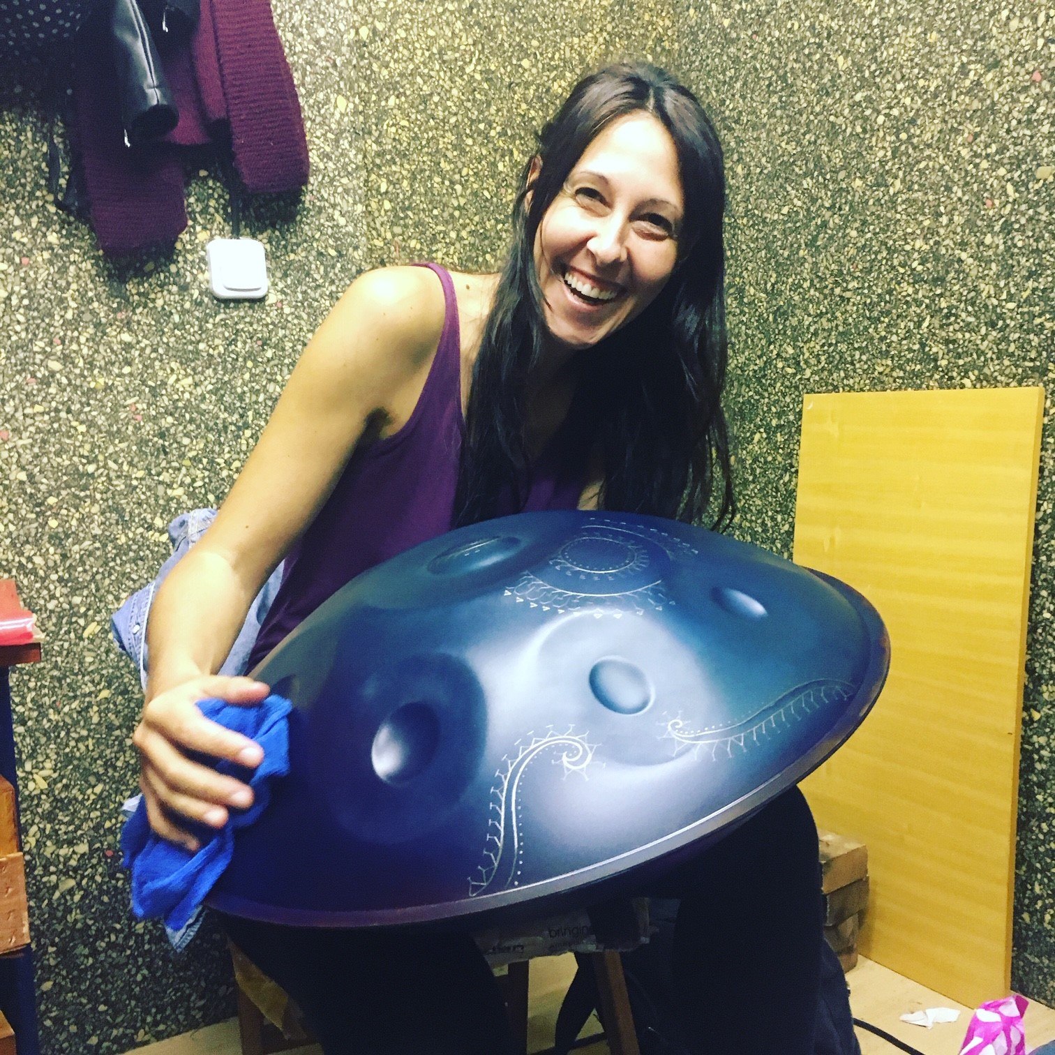 Eli cleaning a handpan